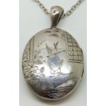 Victorian hallmarked silver locket with engraved swallow decoration, Birmingham 1881