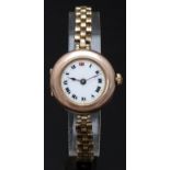 Rolex 9ct gold ladies wristwatch with black and red Roman numerals, gilt minute markers, white