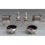 Pair of hallmarked silver mustards with blue glass liners, pair of hallmarked silver open salts with