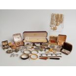 A collection of costume jewellery including brooches, necklaces, paste jewellery, silver bangle,