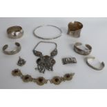 Five bracelets including a Chinese example decorated with fish, white metal necklace etc