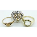 Two silver rings and a 9ct gold ring, 0.9g, size J