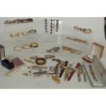 A collection of costume jewellery including bangles, Coro bracelet, watches, Marcel Drucker watch,