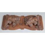 Black Forest carved wood bookslide with bear carrying wood and an axe, minimum length 35cm