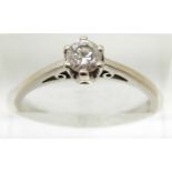 A 9ct white gold ring set with a round cut diamond of approximately 0.3ct, 2.2g, size N