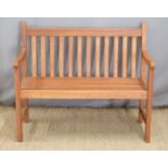 A child's teak garden bench, W73 x H60cm