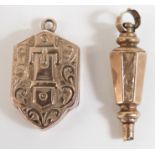 Victorian locket with buckle decoration and engraved decoration and a Victorian watch key