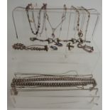 A collection of silver jewellery including necklaces, bracelets, etc