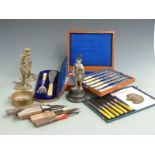 Plated mahogany cased fish service, cased fish servers, figual snake candlesticks, coin inset French