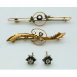 A 9ct gold brooch set with seed pearls in a clover design (Chester 1915), a 9ct gold brooch set with