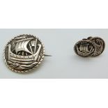 A hallmarked silver Scottish brooch depicting a Viking ship by Robert Allison with matching