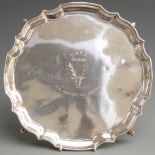 Modern hallmarked silver salver with shaped edge, raised on four scolling feet, London 1967 maker