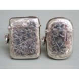 Two hallmarked silver vesta cases, both with engraved foliate decoration, one Birmingham 1908 the