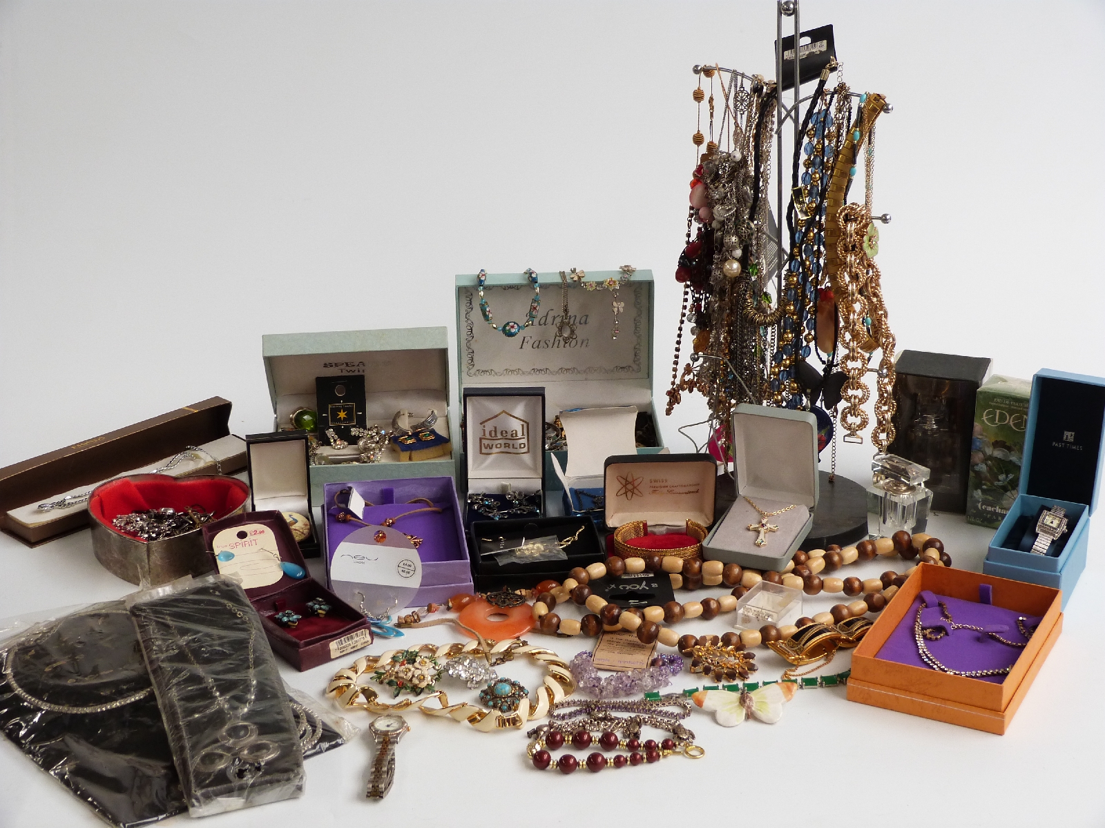 A collection of jewellery including silver charm bracelet, brooches, etc