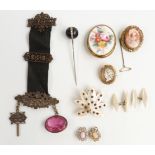 A collection of jewellery including two Victorian cameos, a mother of pearl brooch set with cut