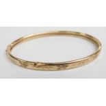 A 9ct gold bangle, 5.9g (6.7 x 5.3cm)