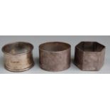 Three various hallmarked silver napkin rings, one of hexagonal design, weight 99g