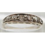 An 18ct white gold ring set with eight diamonds, 2.3g, size N