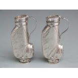 Pair of Garrard modern novelty hallmarked silver salt and pepper formed as golf bags, London 1991,