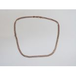 A 9ct rose gold curb link necklace, 22cm drop, 12.4g