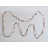 A 9ct gold necklace made up of square and circular links, 10.9g