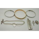 A rolled gold bangle, silver bangles, silver ingot, bracelet etc