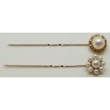 Two 9ct gold stick pins set with pearls, 2.8g