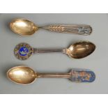 Three Danish white metal and enamel spoons, one 1931 maker Christian F Heise, another 1934 maker
