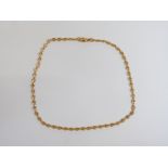 A yellow metal necklace marked 333, 20.5cm drop, 11.0g