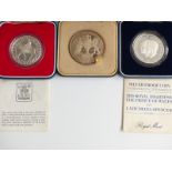 Centenary of England v Australia Ashes silver medal coin, together with two Royal commemorative