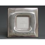 Concorde hallmarked silver photo frame with easel back by Corrs, overall size 12 x 12cm