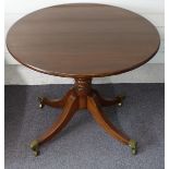 Mahogany circular table raised on four legs, diameter 80cm, height 74cm