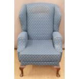 Upholstered floral wing back armchair, H100 x W66 x D92cm