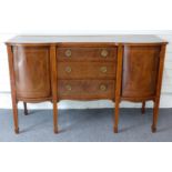 Late 19th/early 20thC sideboard having three drawers flanked by cupboard, raised on square
