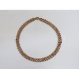 A 9ct gold gate link necklace 23cm drop, 26.3g