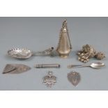 Hallmarked silver money clip, a white metal spoon, two hallmarked silver fobs, an S.Mordan & Co