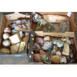 A large collection of mineral samples, some polished.