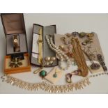 A collection of jewellery including brooches, Jewel Craft earrings, watches, a 9ct gold back and
