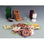 Quantity of collectables including retro table lighter, 1980s beer mats, glass ware etc.