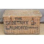 Vintage wicker laundry basket marked 'The Sanitary Laundry (Hereford) Ltd'