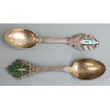 Two Danish white metal and enamel spoons, one 1930 maker Christian F Heise the other 1932 maker