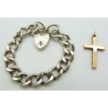 A 9ct gold cross pendant and a silver curb link bracelet