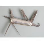 Miniature or salesman's vintage multi tool penknife with 7 blades and white metal sides,  length 4.