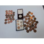 An amateur coin collection including tubes of mint uncirculated examples, booklets etc