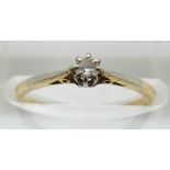 An 18ct gold ring set with a diamond in a platinum setting, in Cheltenham box, 1.5g, size J