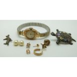 A 9ct gold ladies watch, a pair of silver earrings, a penguin charm and a silver turtle brooch