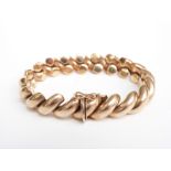 A 9ct gold bracelet made up of diagonal links, 28.1g