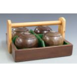 A set of presentation lignum vitae bowls with engraved silver insets dated 1925, in carry case