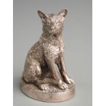 Hallmarked silver novelty model of a seated dog, Sheffield 1987 maker's mark HL, height 9.5cm