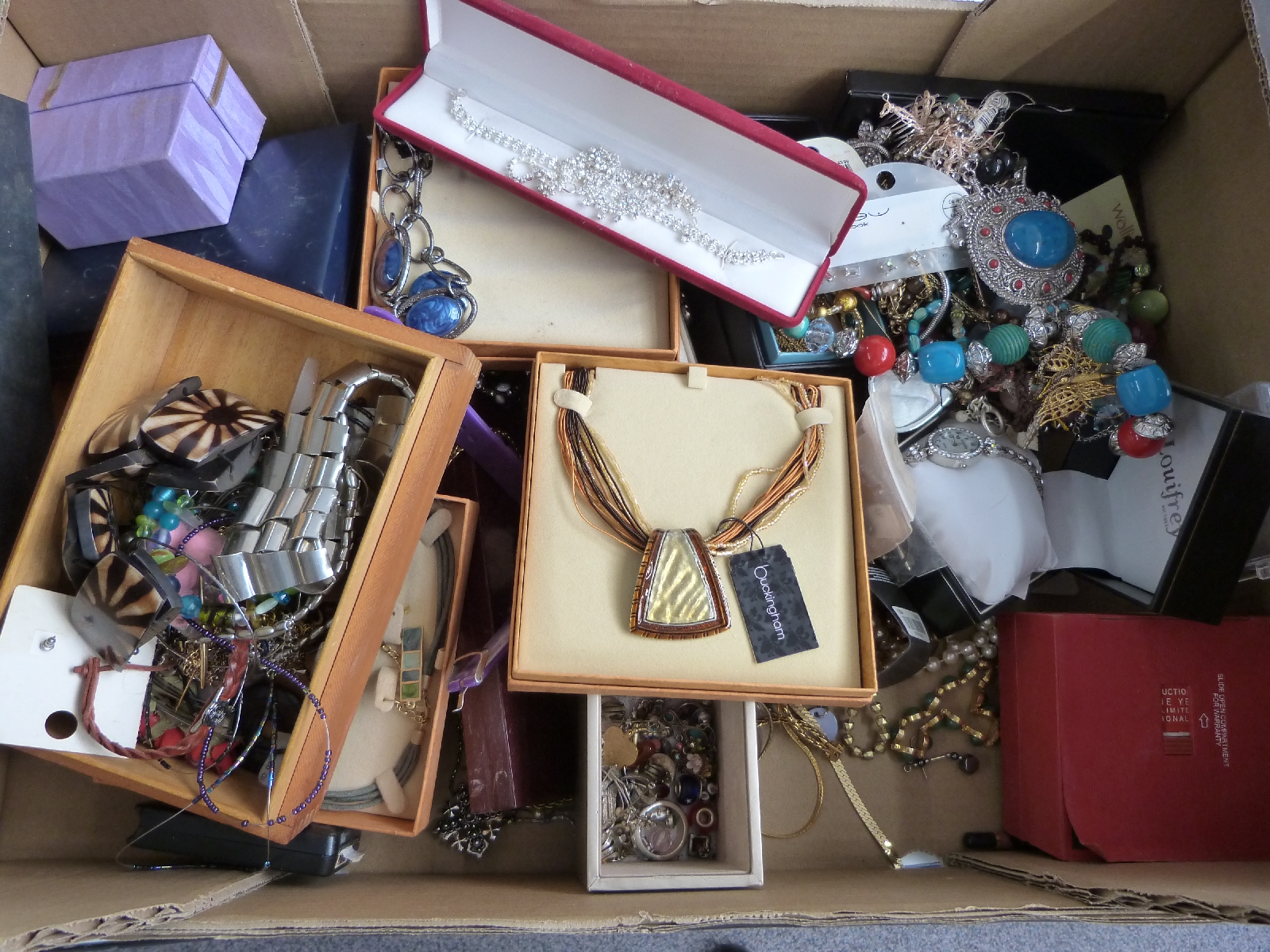 A collection of jewellery including amber necklace, Boucher brooch, Monet necklace, silver ring etc